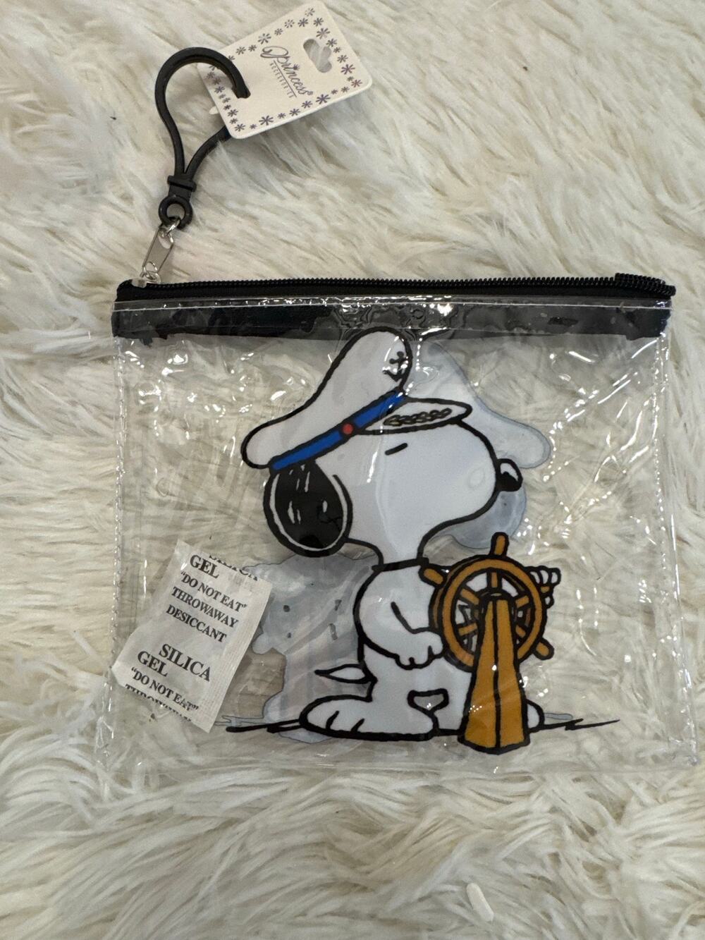 Snoopy captain clear zip pouch keychain with Snoopy holding a steering wheel